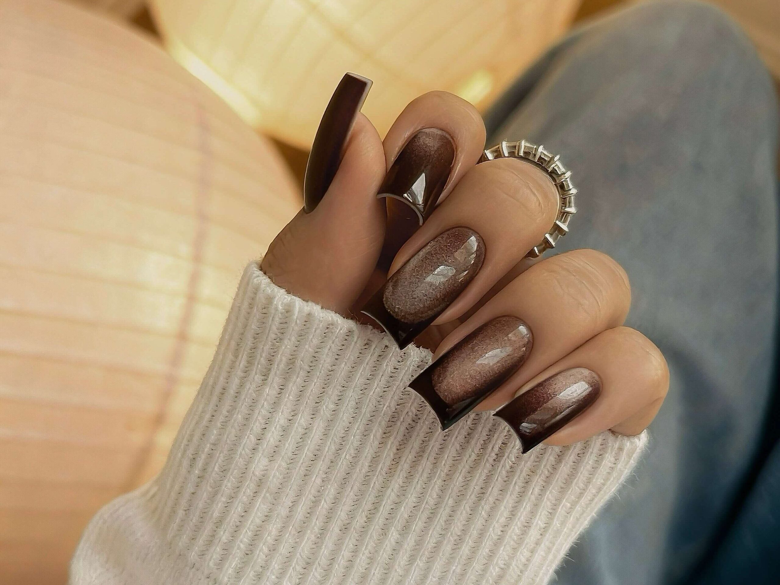 Chocolate French manicure with cat eye effect – 2025 nail trend by Vikki Swan