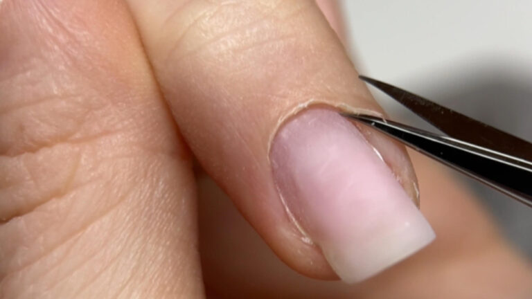 Russian manicure cuticle cleaning with precision scissors